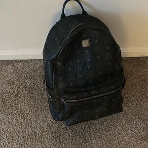MCM Black Monogram Backpack with Dome Shape and Structured Design